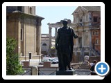 Rome - along Via dei Fori Imperiali - Statue of Julius Ceasar  (100 BC - 44 BC) with Clivo Argentario in the background